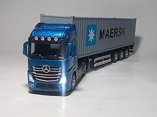 شاحنة كابينة معدن الكونتينر بلاستيك صوت موتور وكلاكس وإضاءة أمامية وسحب خلفى وفتح أبواب خلفية الطول٣٣ العرض٦ الإرتفاع٨سم فصل الكابينة عن التريلا تصلح لمعارض السيارات ومحبى نماذج السيارات