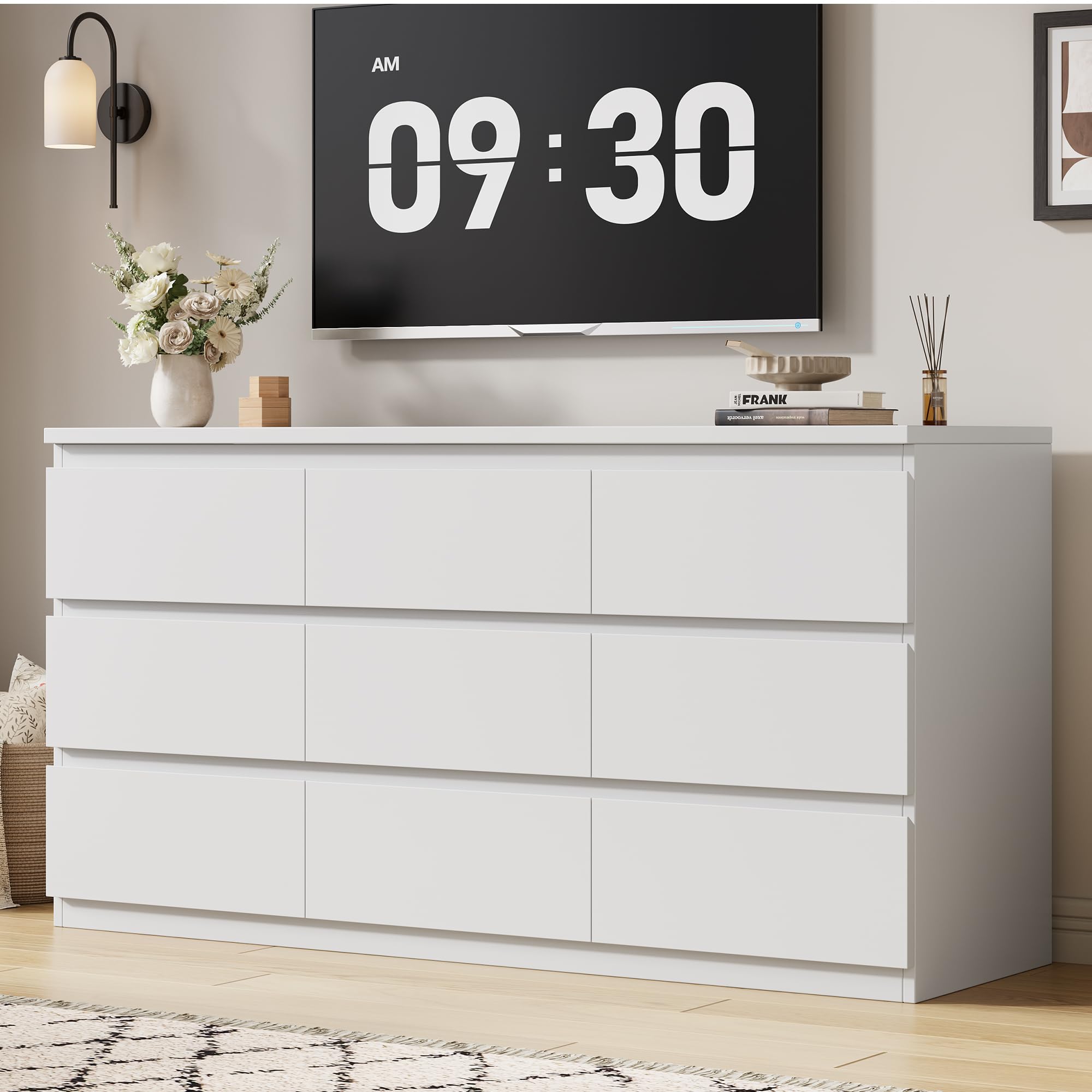 Full view of the assembled Jocoevol Modern White 9-Drawer Dresser in a bedroom setting.
