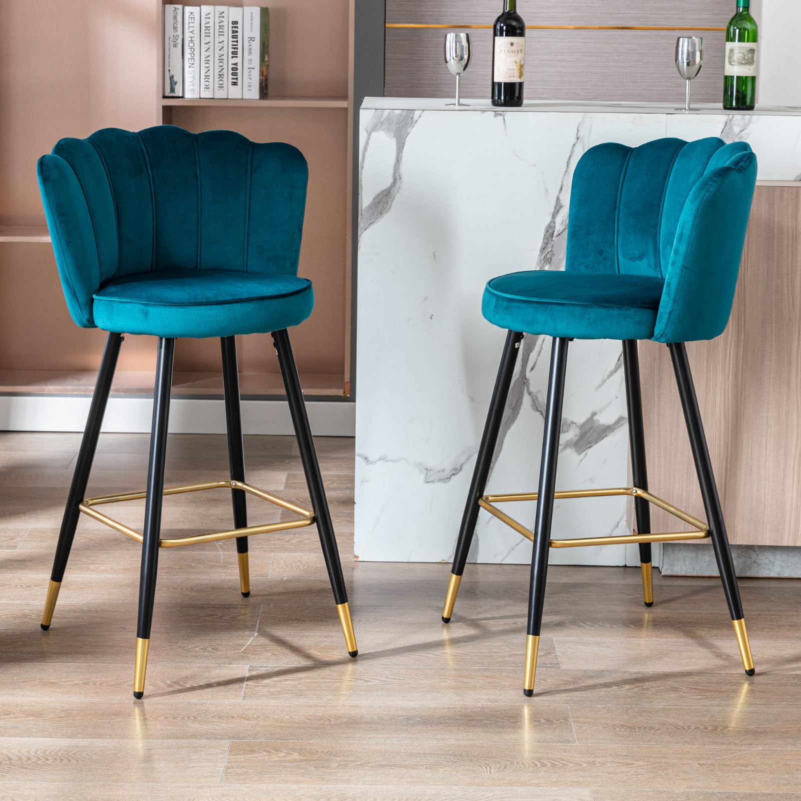 Taburete alto de terciopelo turquesa con patas negras y doradas