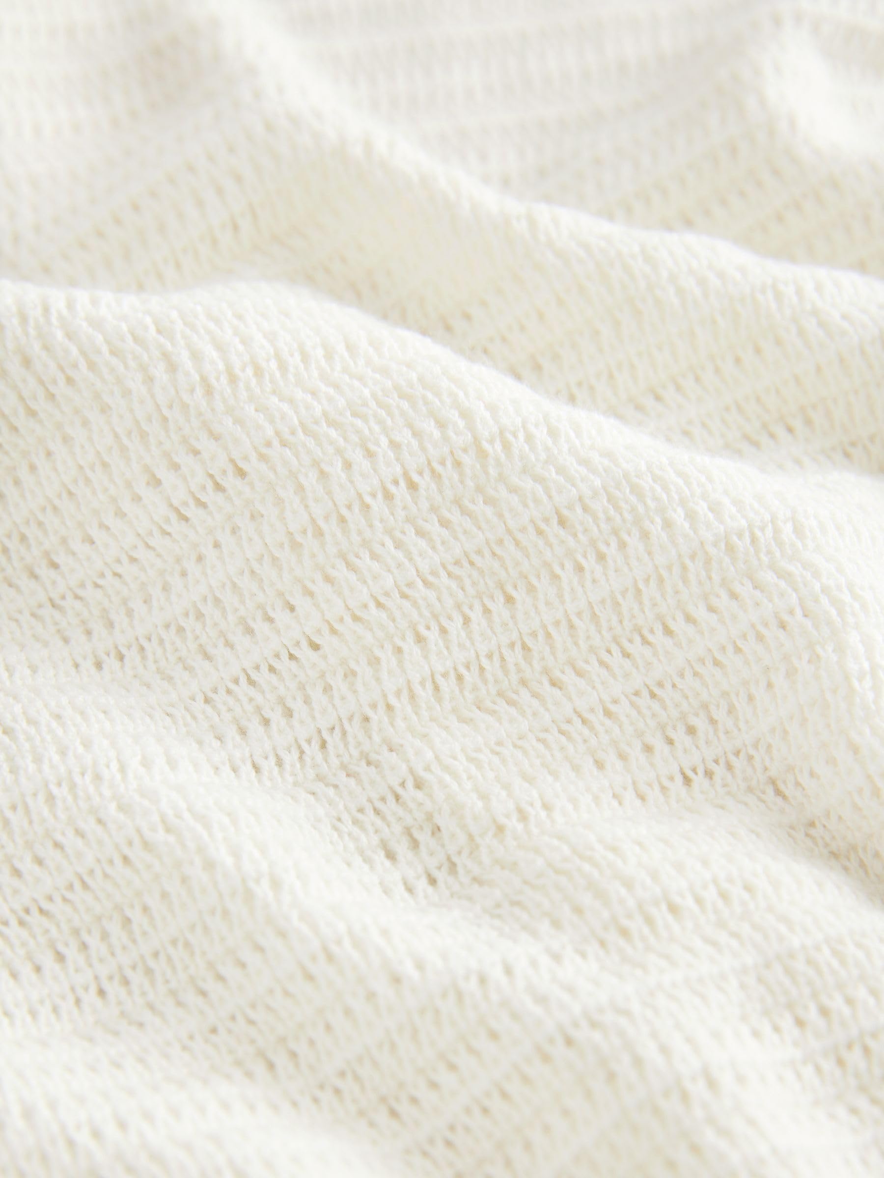NEXT Garçon Polo en Maille 100% Coton à Manches Courtes texturé et col à Revers