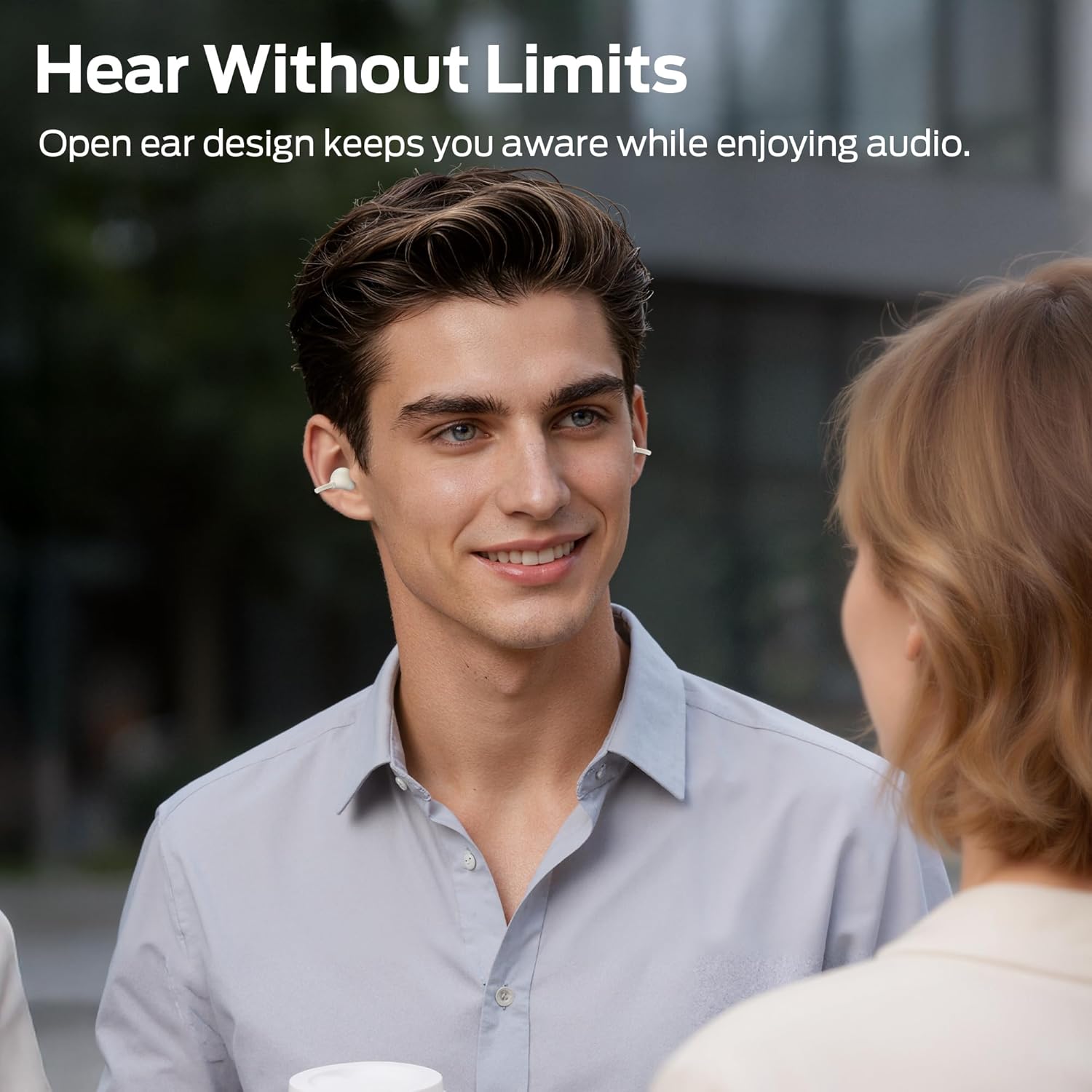 Person wearing Monster AC220 Open Ear Earbuds