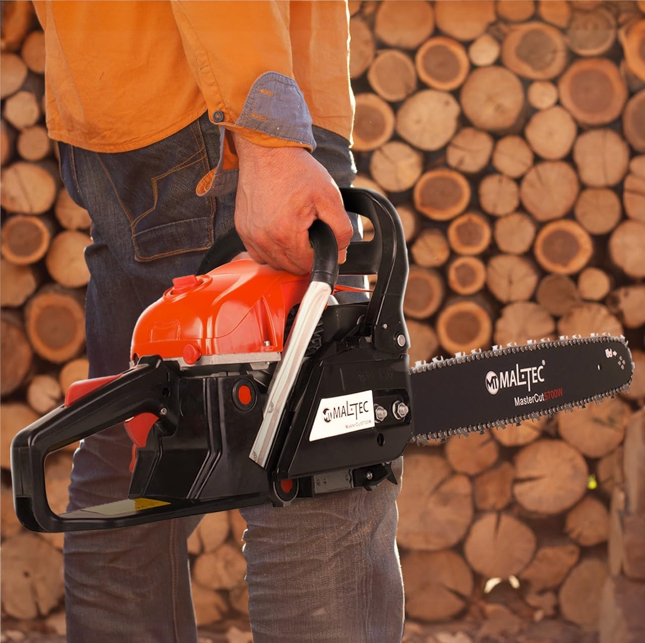 Person holding MalTec chainsaw
