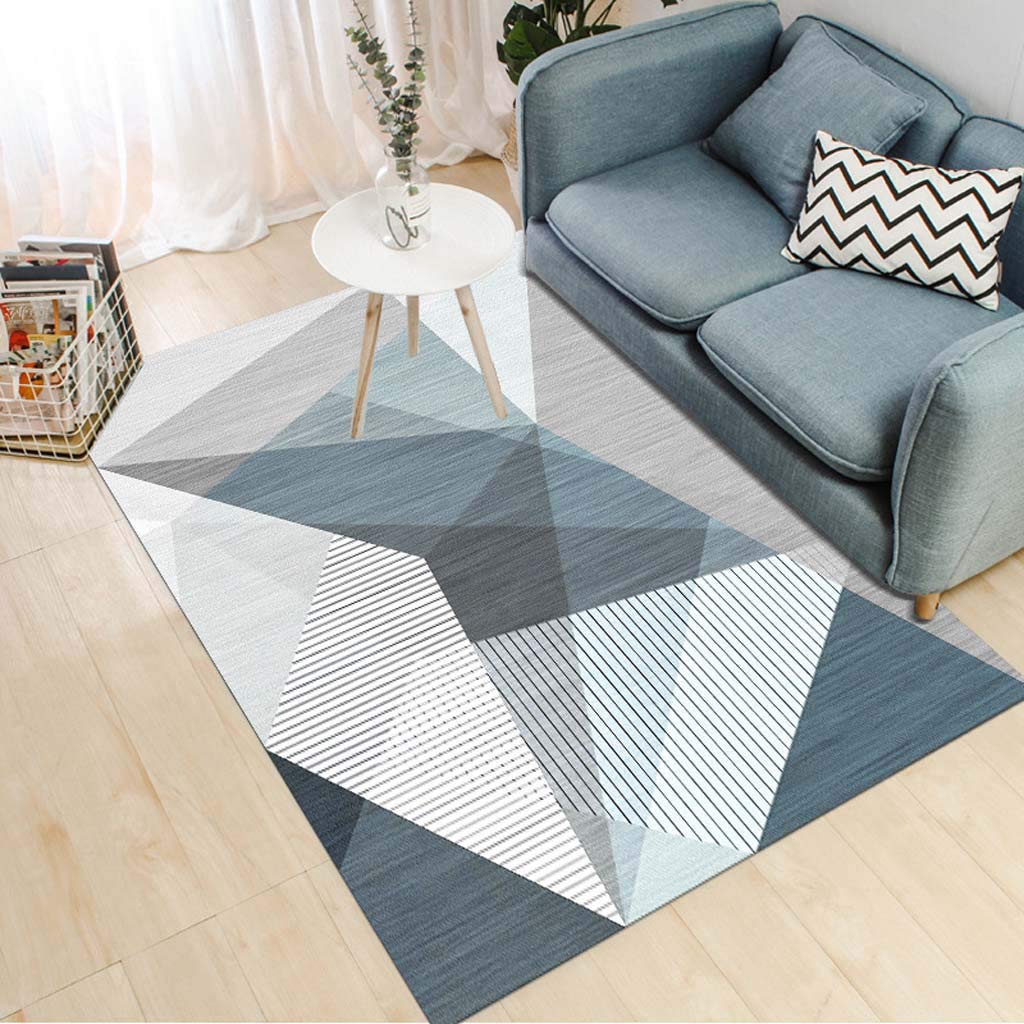Tapis de salon moderne pour réchauffer un sol carrelé avec style géométrique