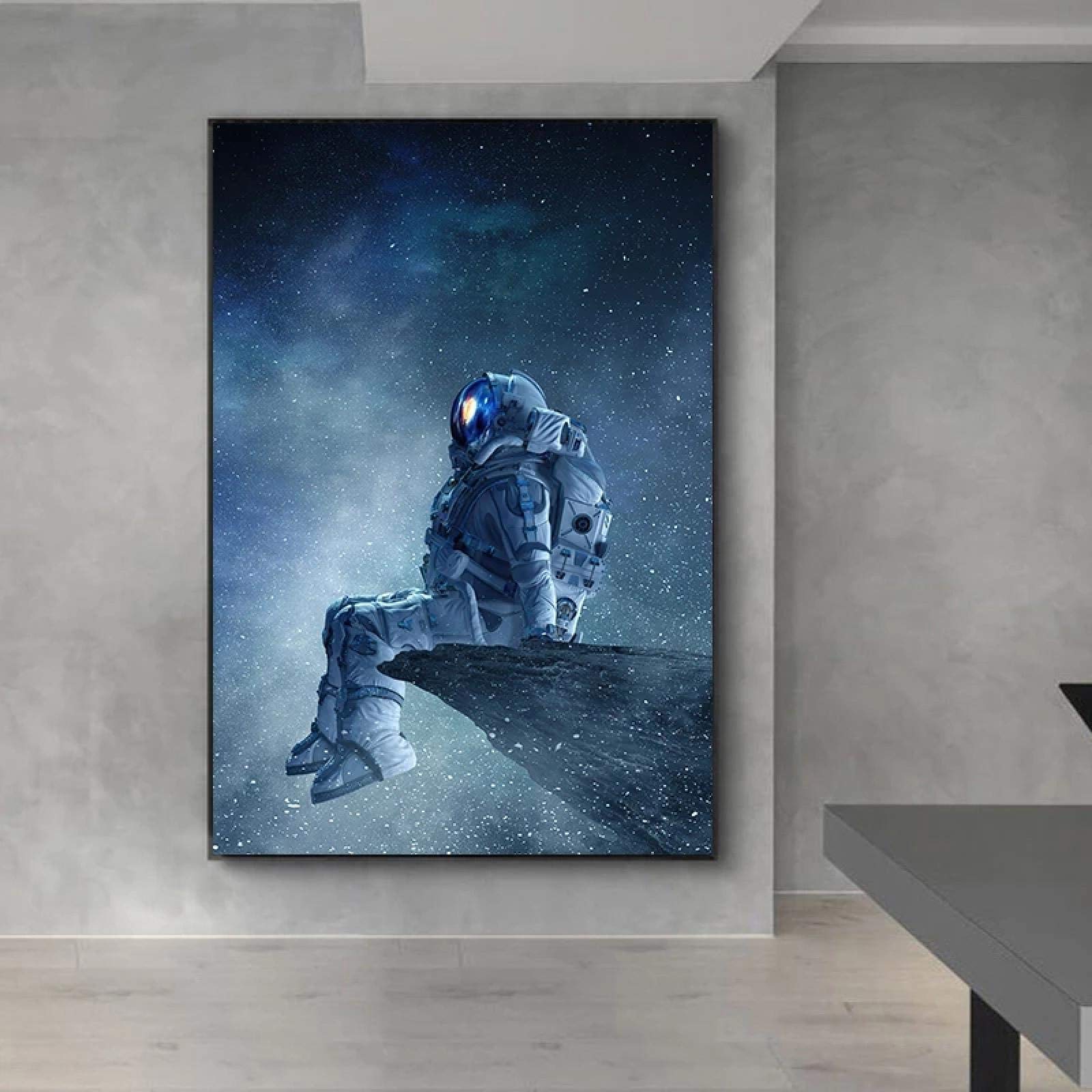 Arte moderno astronauta solitario sentado en el espacio pintura en lienzo carteles e impresiones cuadros de arte de pared para decoración de dormitorio 60x90cm (24x35in) marco blanco