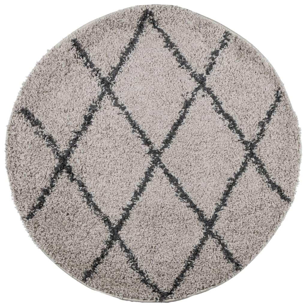 Alfombra redonda de pelo largo Pamplona beige para un salón cálido y acogedor