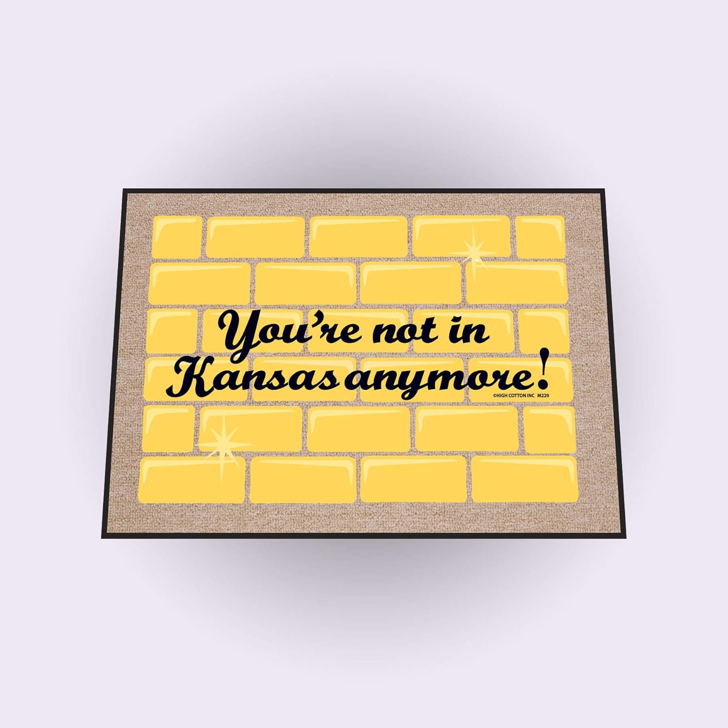 High Cotton Not in Kansas Anymore Doormat, Yellow with brick background