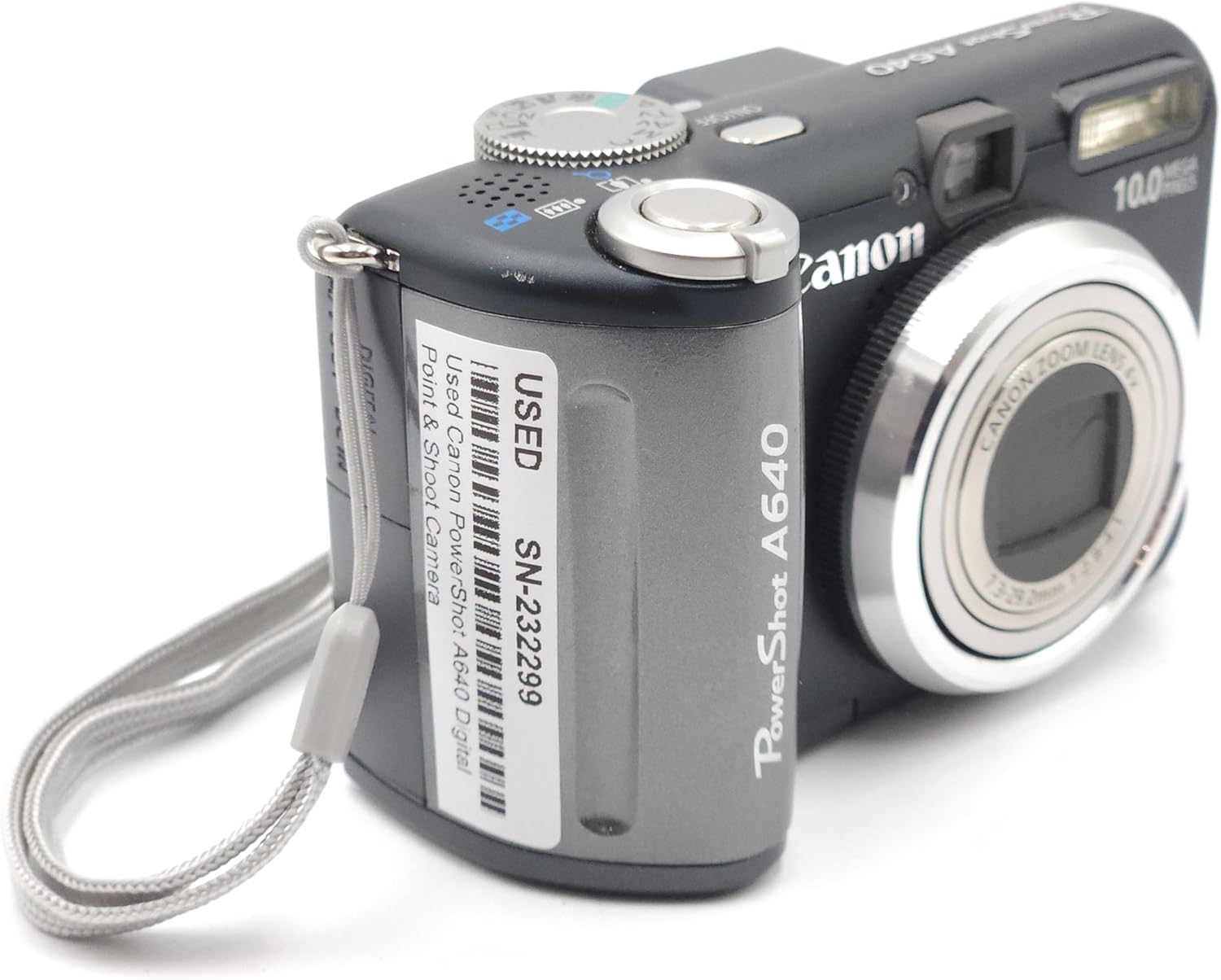 Canon PowerShot A640 digital camera with two user manuals titled 'Advanced Camera User Guide' and 'Basic Camera User Guide'.