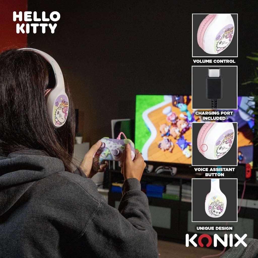 Person wearing Konix Hello Kitty headphones, showing controls for volume, charging port, and voice assistant button.