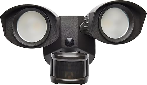 Nuvo 65219 - Luz LED de seguridad de doble cabezal, 4000 K, sensor de movimiento, bronce