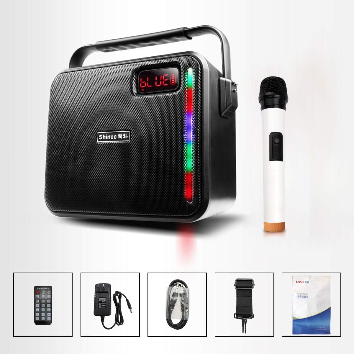 Shinco Portable PA System with included accessories: wireless microphone, remote control, power adapter, audio cable, shoulder strap, and user manual.
