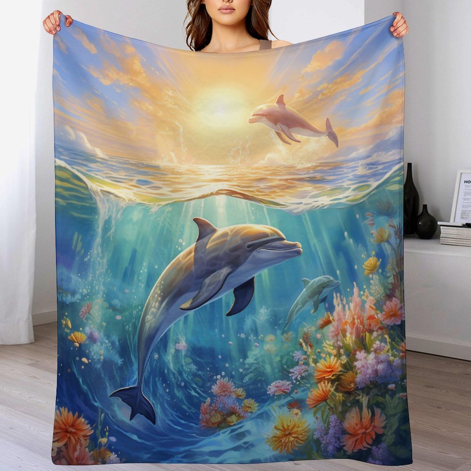 Couverture canapé dauphins pour des moments cocooning dans le salon