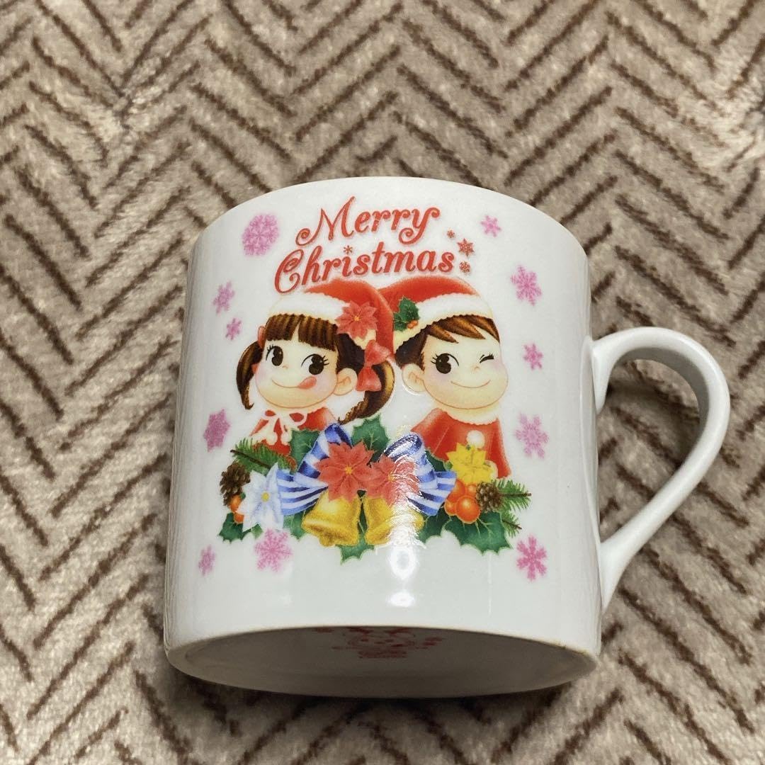 不二家　ペコちゃん　コップ Amazon.co.jp: 不二家 50周年記念 ミルキー ペアマグカップ 陶器
