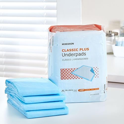 Miniatura 9 de McKesson Almohadillas clásicas para cama de incontinencia, absorción de luz, 23 x 36 pulgadas, 50 unidades