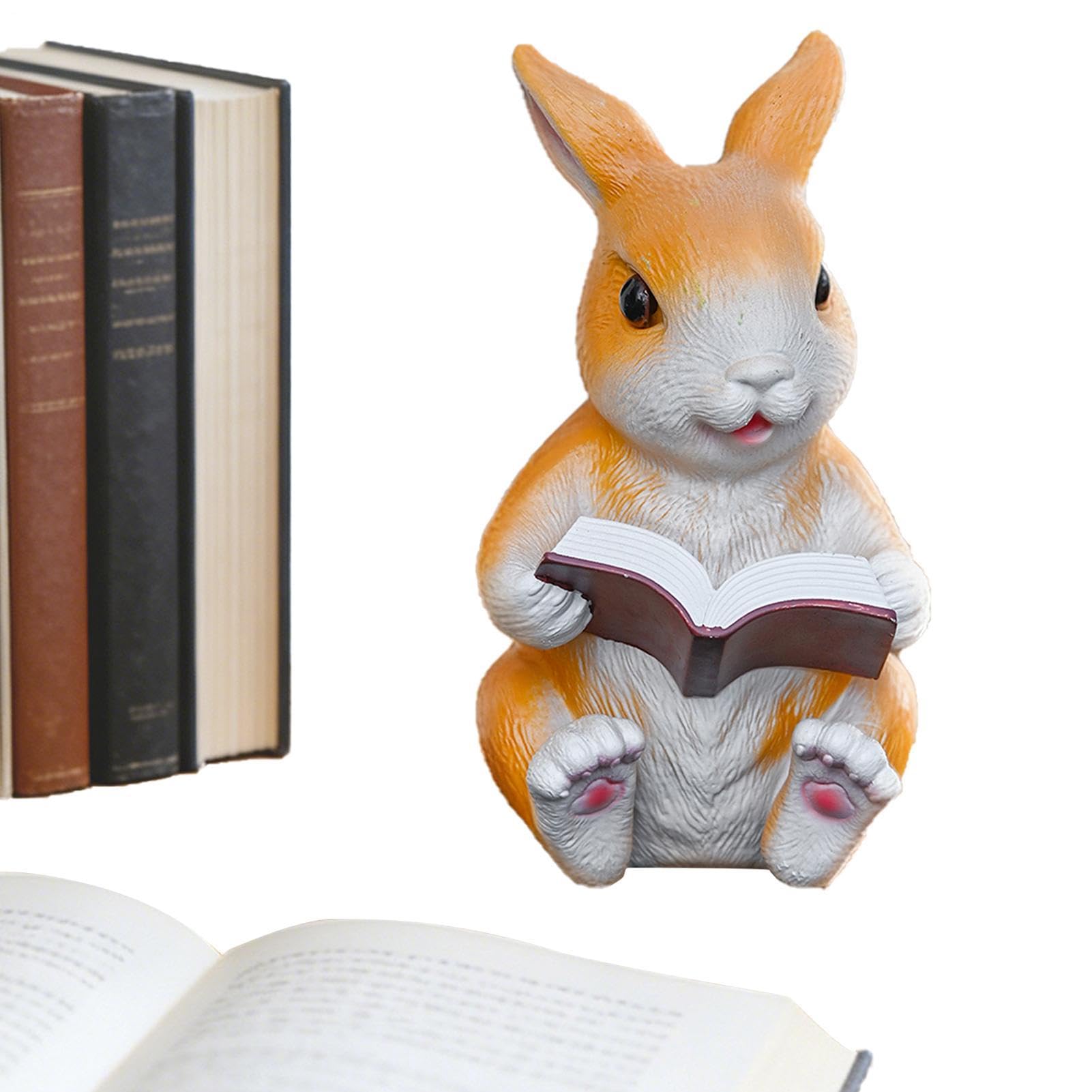 Statue de lapin lisant un livre pour créer un coin lecture cosy