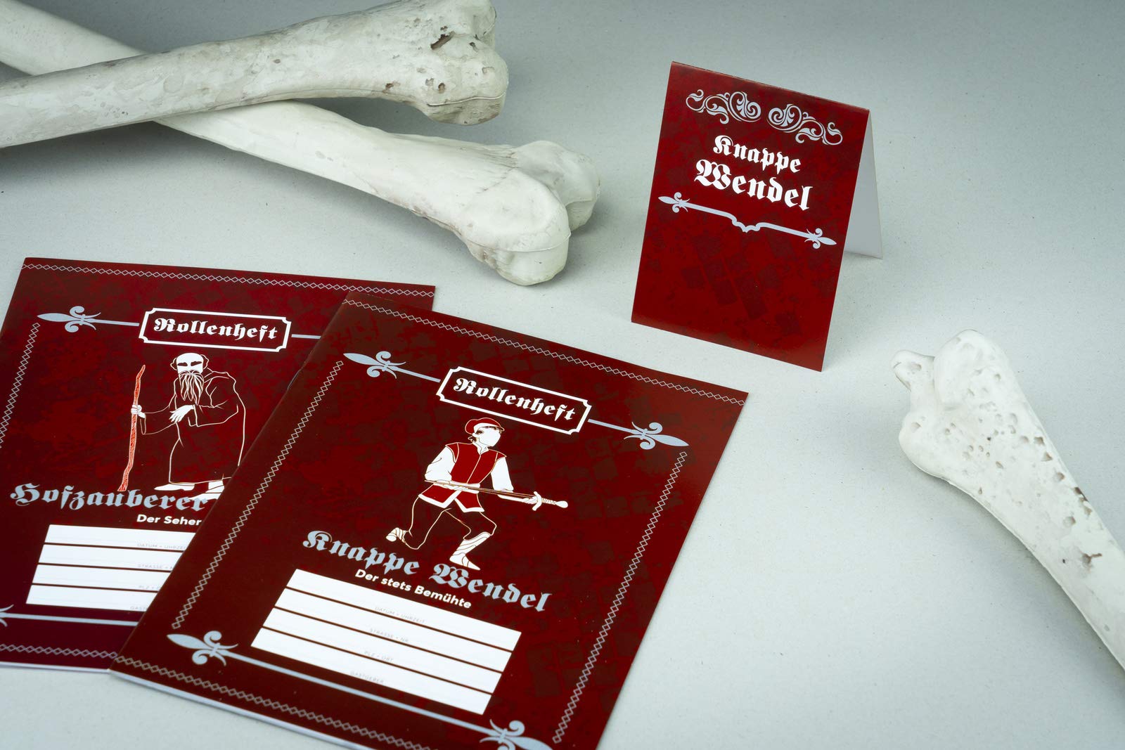 Krimi al dente – Dunkles Mittelalter – Im Abgang königlich: Das Krimi-Dinner für 5–8 Spieler inkl. Namensschildern, Rollenheften, Ereignissen, Rezepten sowie Deko- und Kostümtipps.