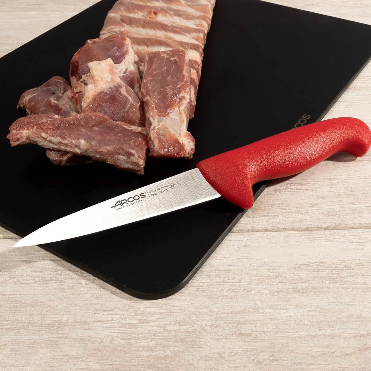 Arcos Butcher Knife 6 Inch Nitrum Stainless Steel and 150 mm blade. Professional Cooking Knife For Cutting Meat, Fish and Vegetables. Ergonomic Polyoxymethylene Handle. Series 2900. Color Red.