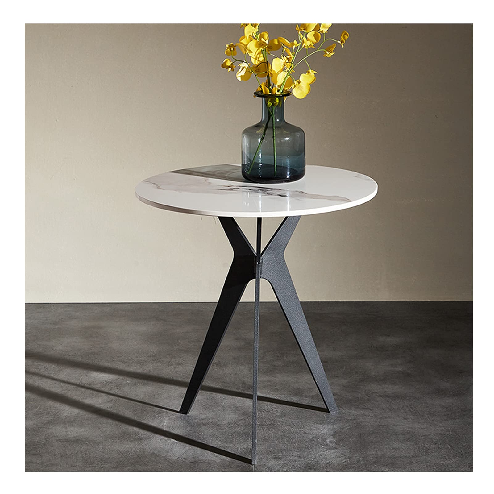 Table d'angle ronde en ardoise parfaite pour un moment détente sur le balcon