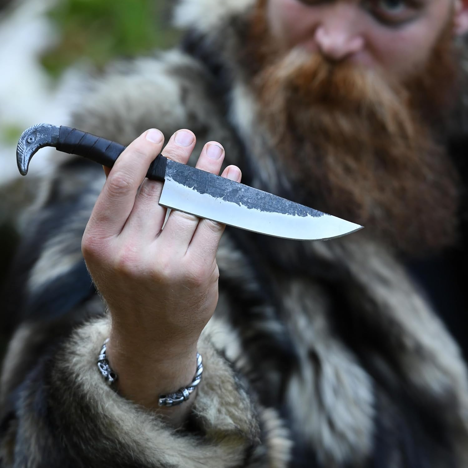 Odin's Raven Norse Viking-styled Knife 10.3" - Hand Forged 6.5" Carbon Steel Blade, Raven's Head Hilt and Leather Sheath - Unique Medieval Seax Style - Norse Knife for Hunting & Camping