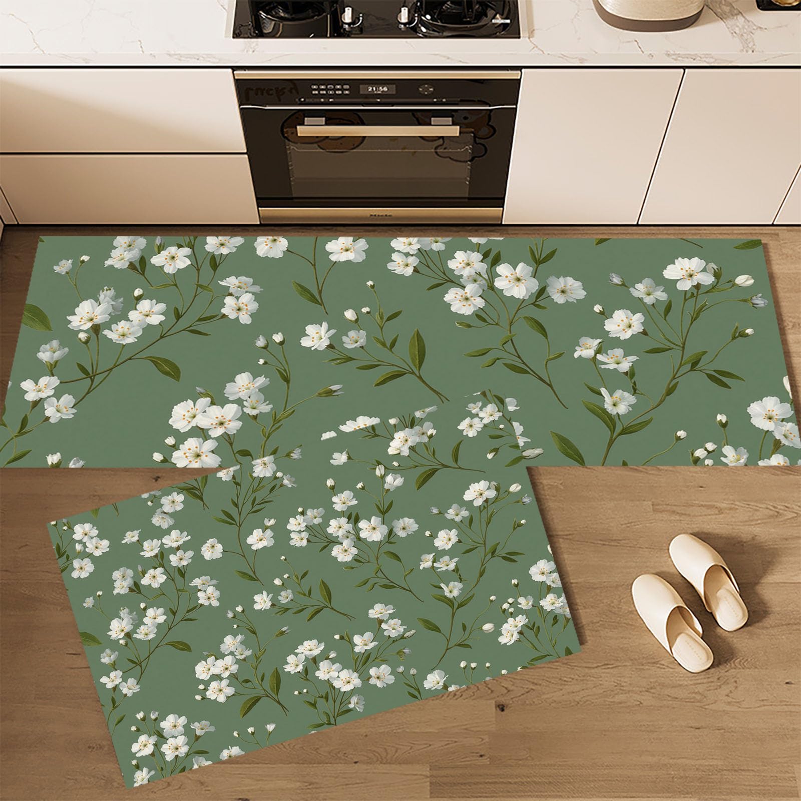 Elegante juego de alfombras de cocina de 2 piezas en verde esmeralda con diseño botánico