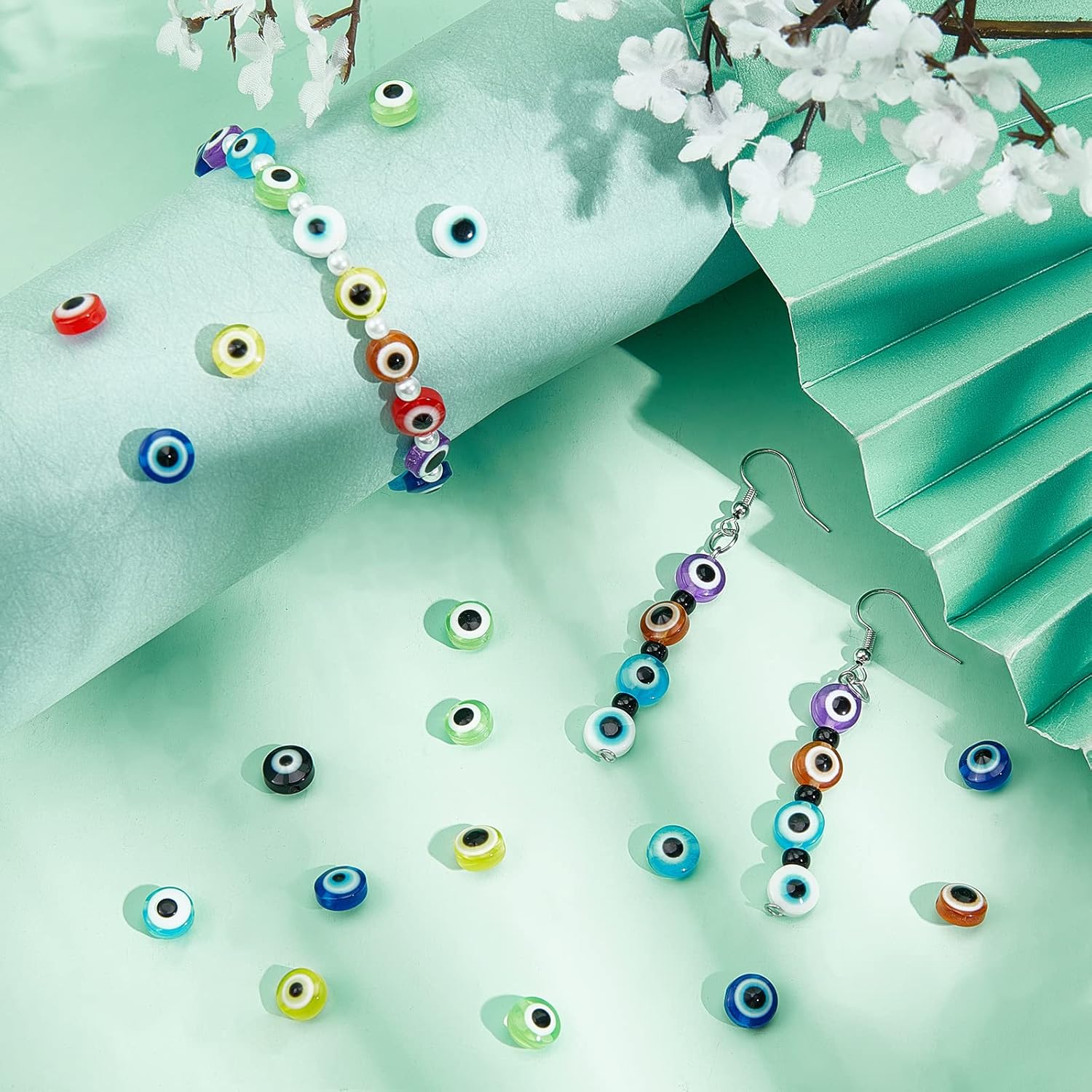 NBEADS 720 Pcs Resin Evil Eye Beads, 3 Sizes Flat Round Evil Eye Beads Colorful Resin Charms Evil Eye Loose Spacer Beads for DIY Jewelry Making