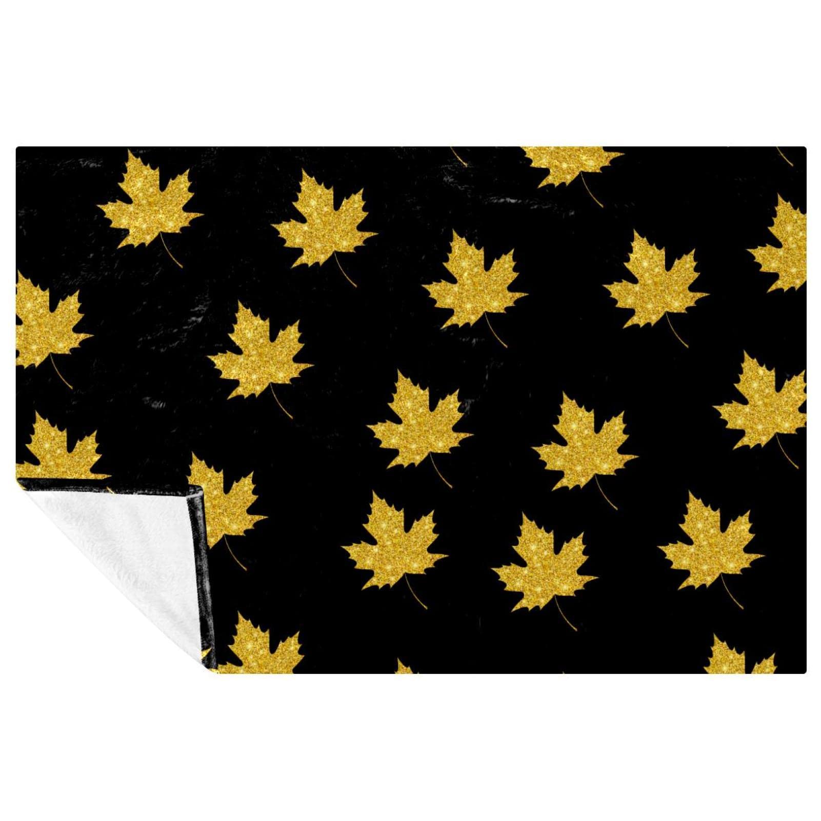 Couverture douce feuilles d'érable dorées, le plaid parfait pour créer un nid chaleureux