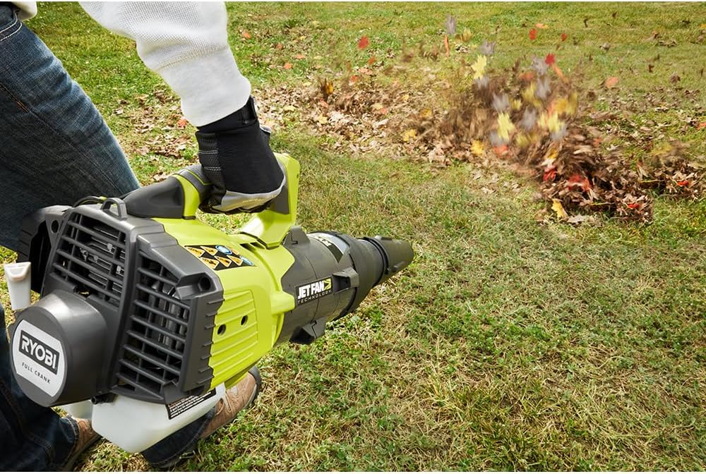 Close-up of RYOBI 25cc Gas Jet Fan Blower in action