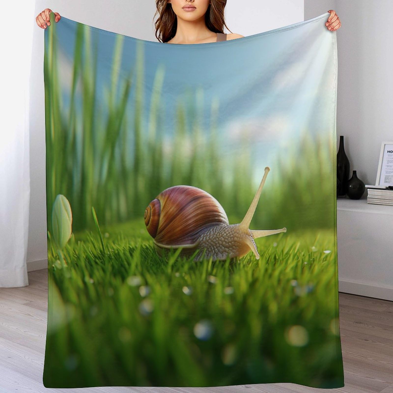 Couverture motif escargots 3D : le plaid idéal pour vos soirées cocooning