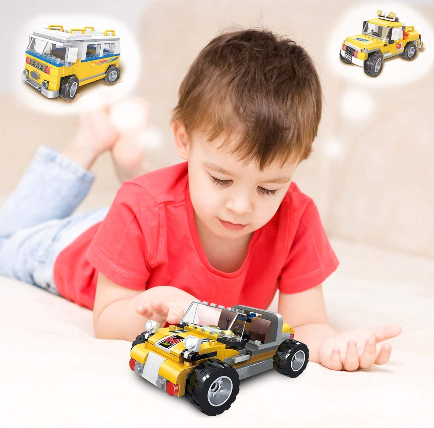 Child playing with the COGO Beach Buggy, with images of the Camper Van and Off-Roader in thought bubbles