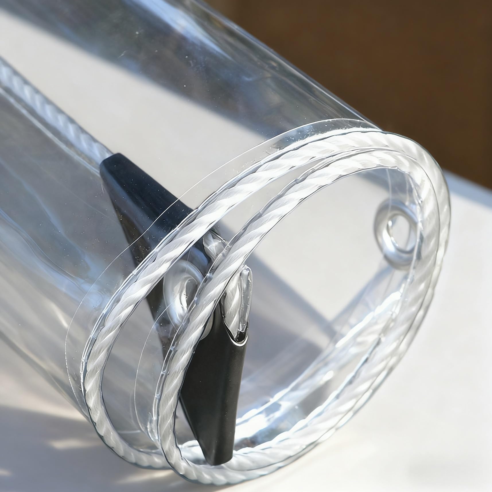 Lona impermeable transparente 155x180 cm con ojales para protección exterior de muebles