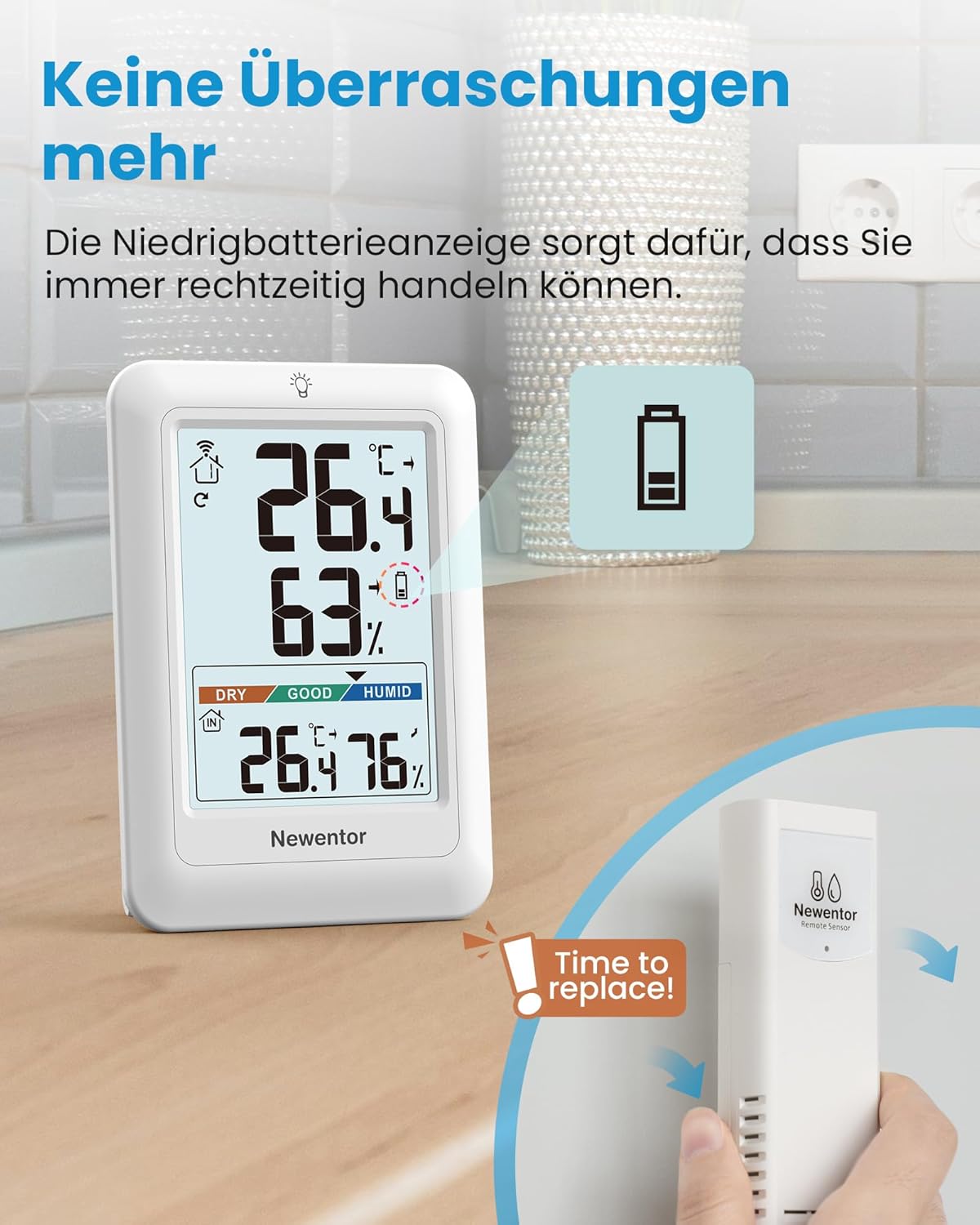 Weather station display showing low battery icon and an illustration of replacing batteries in the outdoor sensor