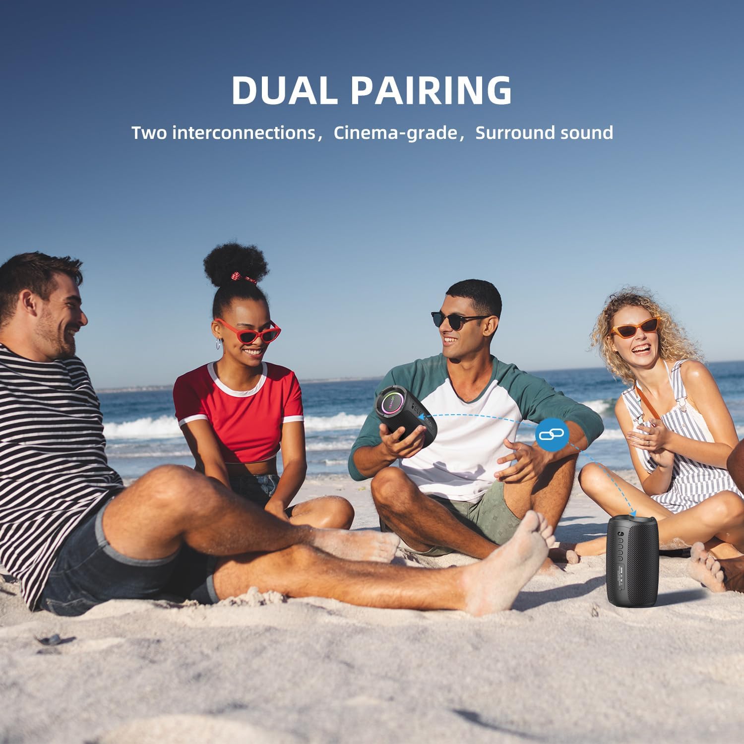 Two ZEALOT S61 speakers in dual pairing mode on a beach
