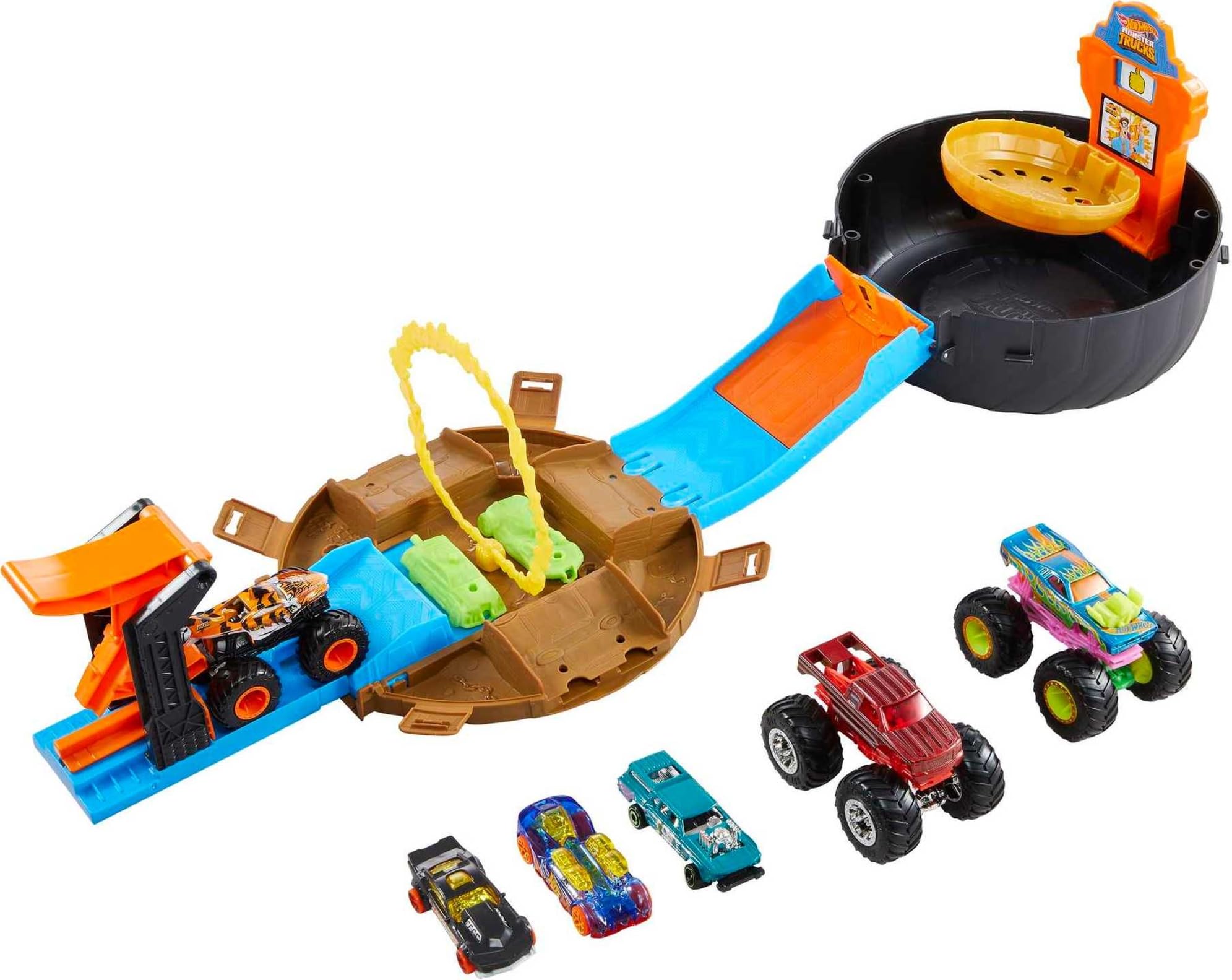 Hot Wheels Toy Monster Trucks Playset, Tire-Shaped Case Transforms into Race Course, 3 Trucks & 4 Cars in 1:64 Scale, Stunt Tire (Amazon Exclusive)