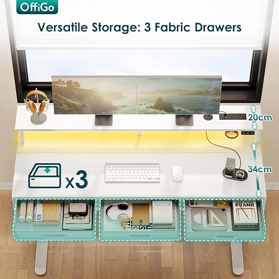 OffiGo Electric Standing Desk, 140 x 54cm Height Adjustable Desk with 3 Drawers, RGB LED Strip & Charging Station for Home Office Computer Workstation, Computer Table with Monitor Stand, White