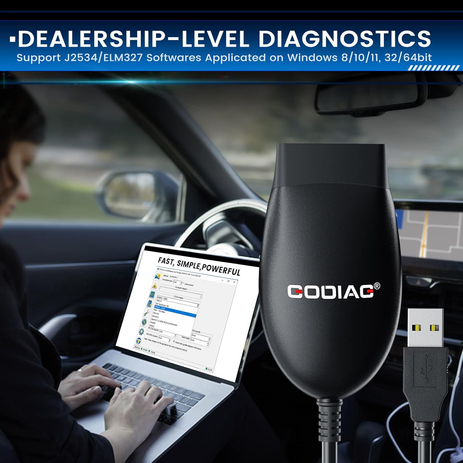 Person using a laptop with the GODIAG GD101 adapter connected to a car for dealership-level diagnostics.