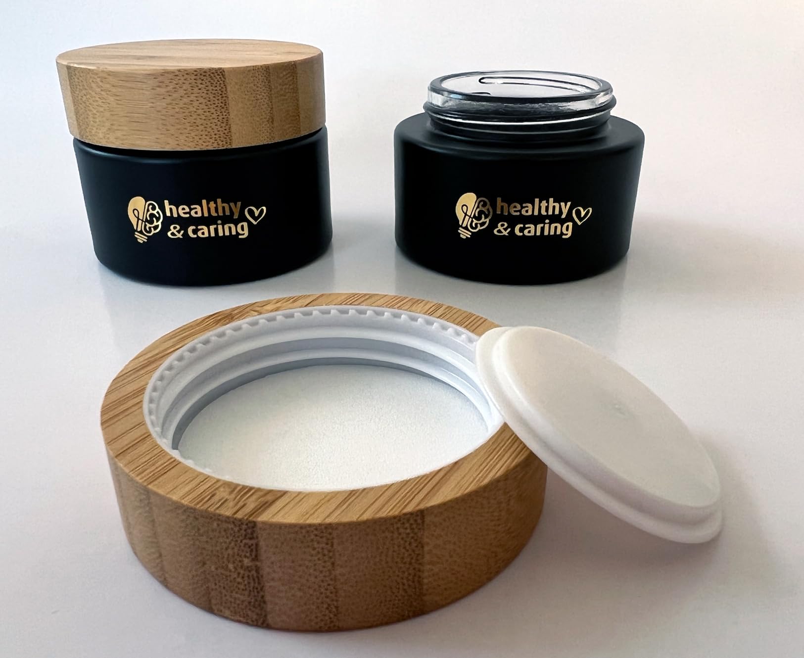 healthy & caring Black Glass Cosmetic Container (50 ml) with Bamboo Lid and Golden Emblem (2 Jars) - Image 3