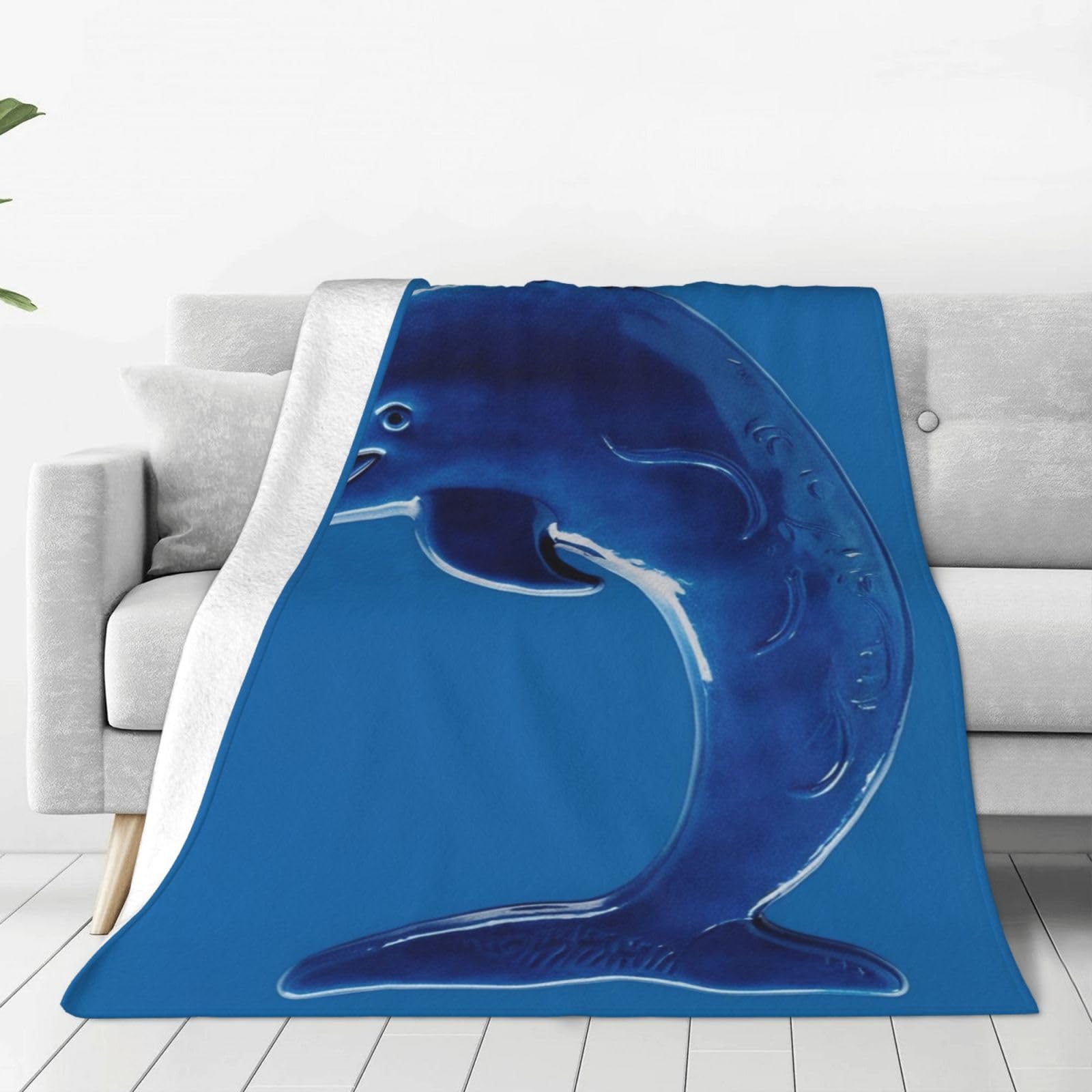 Couverture polaire légère pour soirées cocooning sur le canapé et nuits fraîches