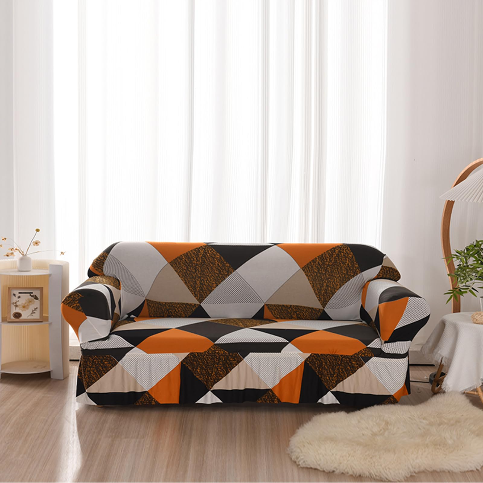 Housse extensible de protection canapé imprimée avec finition jupe dentelle