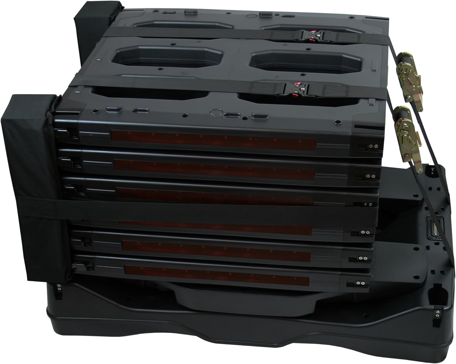 The metal detector collapsed and secured with straps for storage or transport.