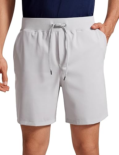 CRZ YOGA Pantalones cortos de entrenamiento elásticos en cuatro direcciones para hombre, 7 pulgadas, suaves, duraderos, casuales, con bolsillos,