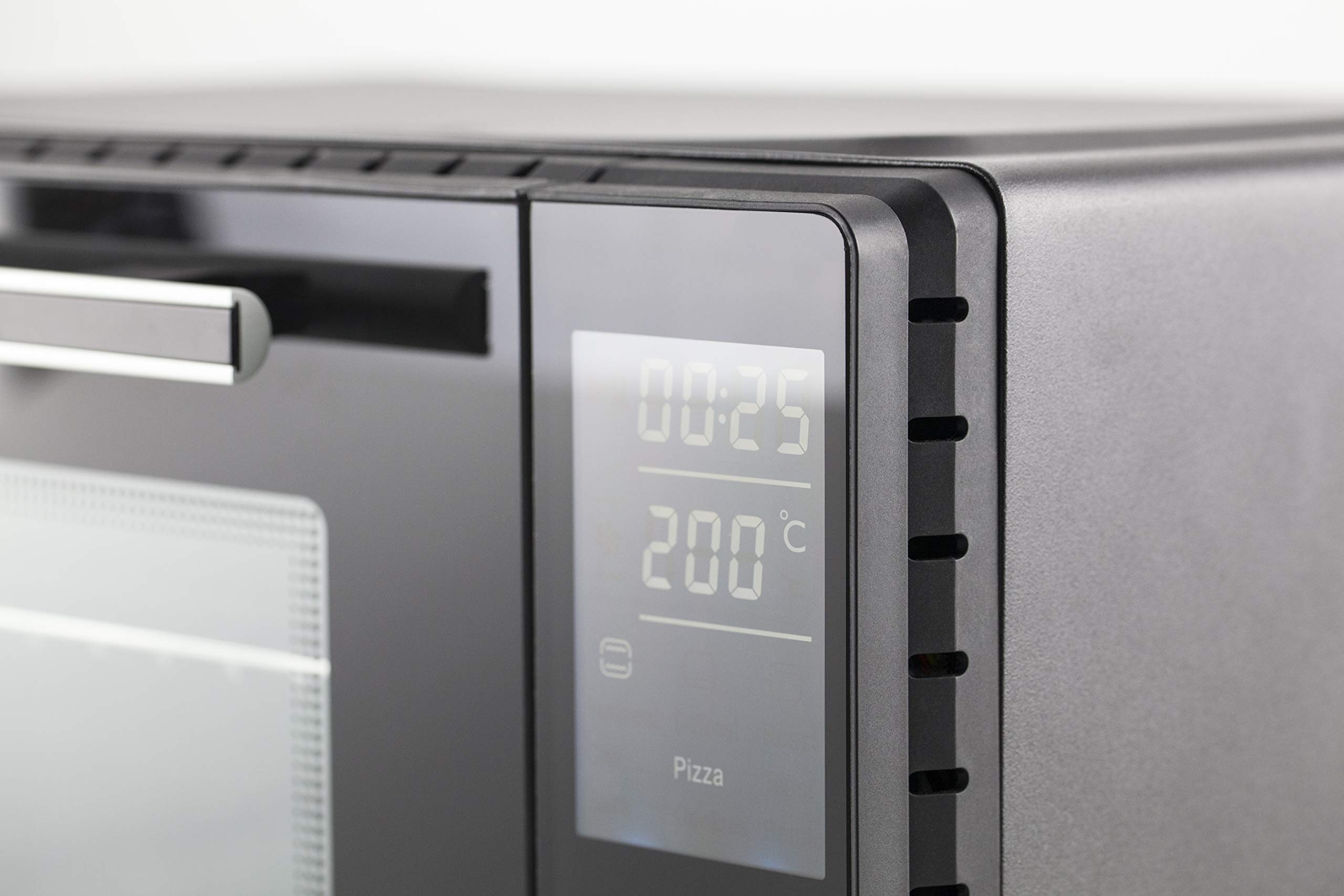 CASO TO26 Design Backofen Heißluft Drehspieß mit Motor Ober- und Unterhitze Mini-Backofen inkl. Pizzastein