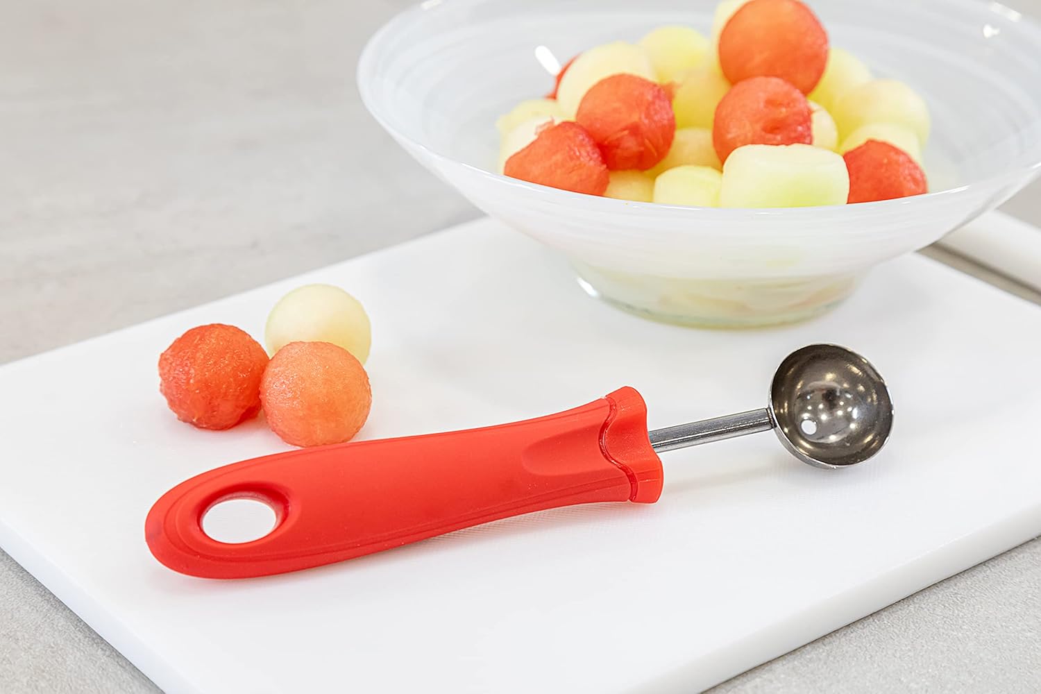 KitchenCraft Melon Baller Fruit Scoop, Soft Grip Easy to Clean Stainless Steel Head Cuts, 17cm (6.7"), Red
