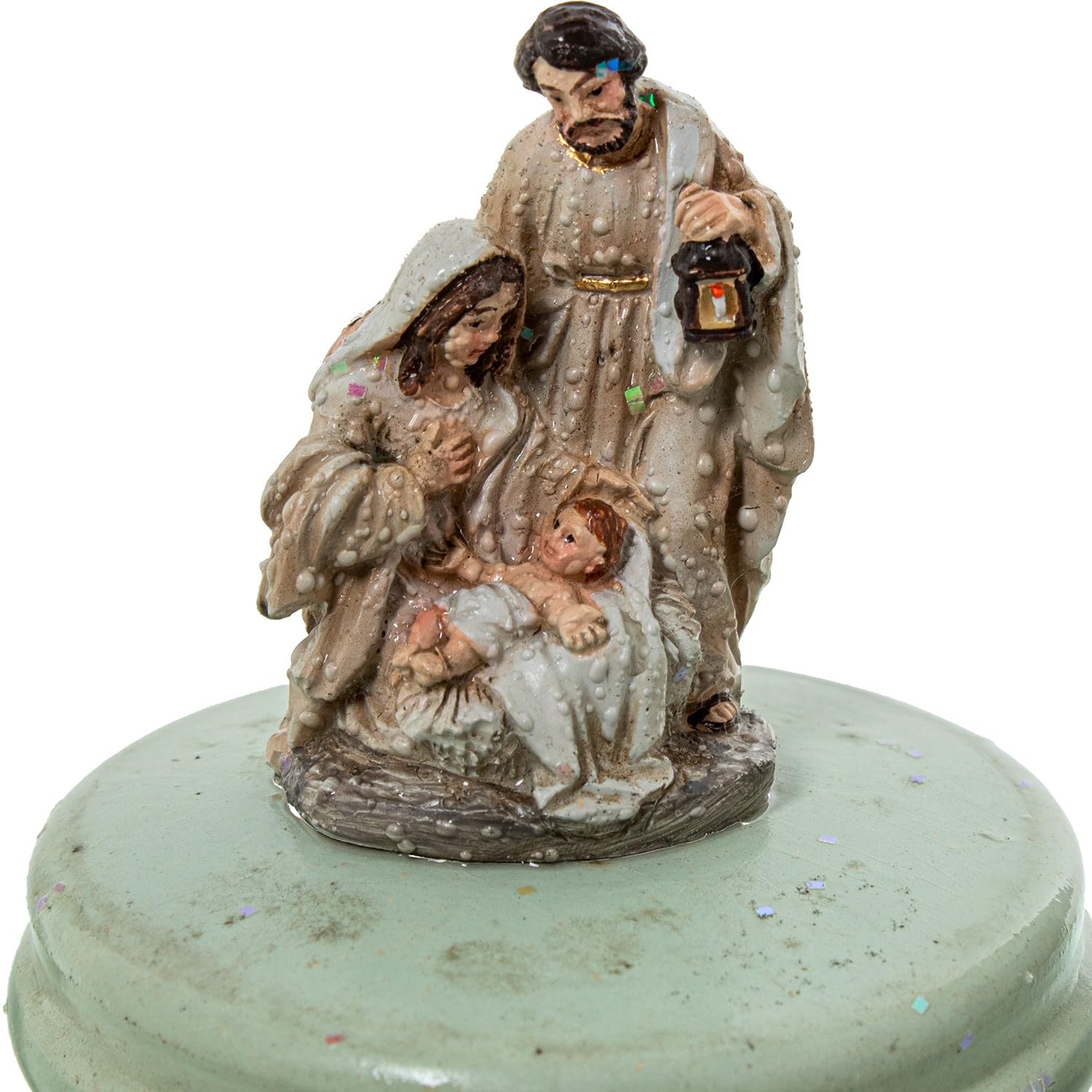 Figura de una Bola de Nieve con la Sagrada Familia en Tonos Naturales y Dorado 5x13x10 cm