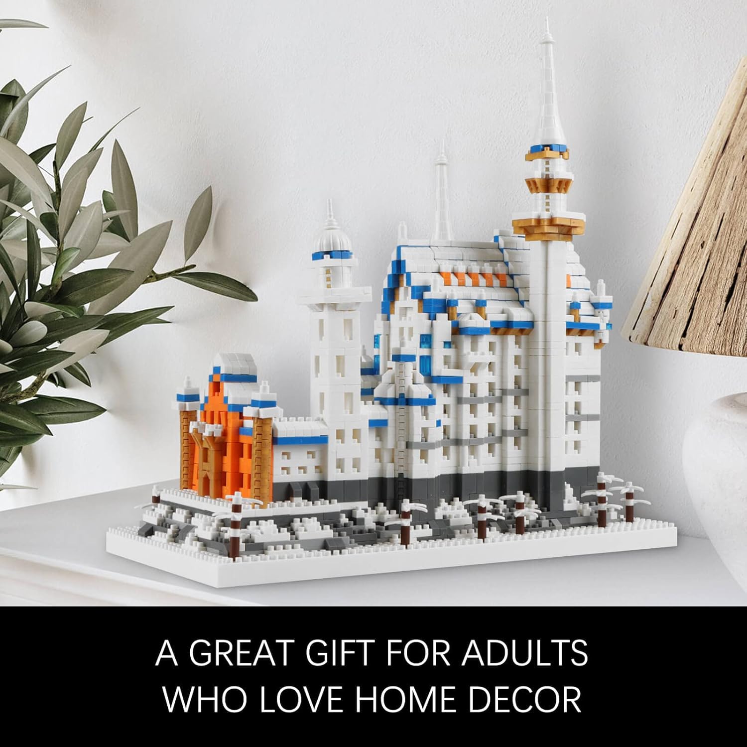 Completed Vziimo Swan Stone Castle model displayed as a decorative piece.