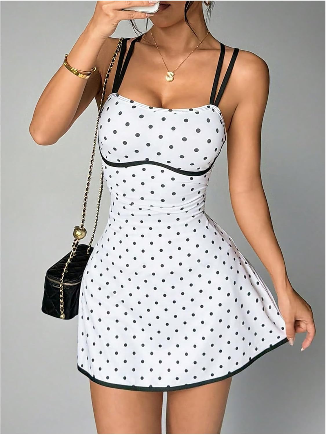 WDIRARA Women's Polka Dots Tennis Dress Spaghetti Strap Criss Cross Back Athletic Mini Dress with Shorts Pocket image 4