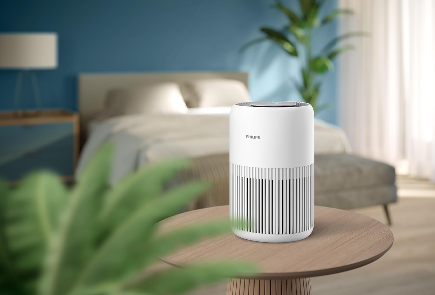 Philips PureProtect Mini Air Purifier placed on a bedside table