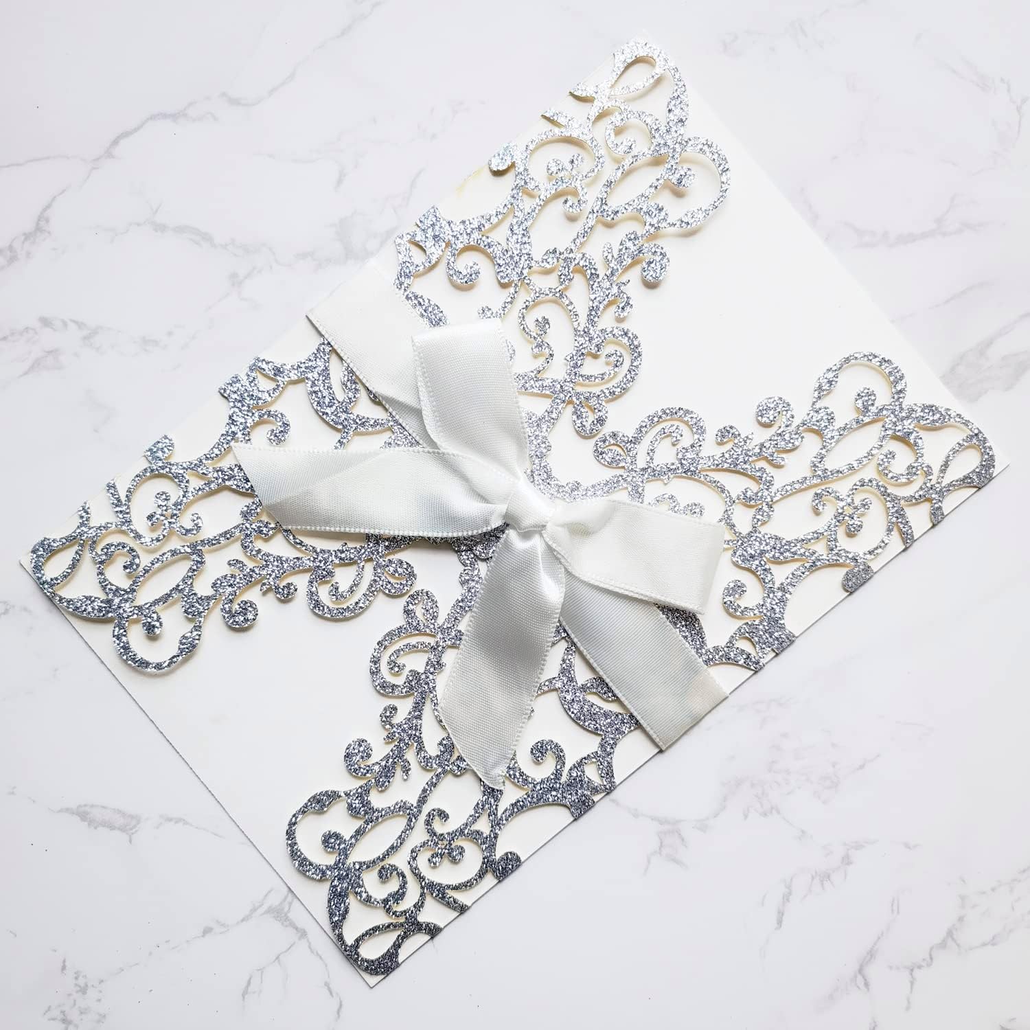 50PCS 5 x 7 Inch Silver Wedding Invitation Kit with Envelopes and Ribbons Laser Cut Hollow Floral Blank Invitations Card for Engagement Quincenera Sweet 16 Birthday Invite (Silver Glitter)