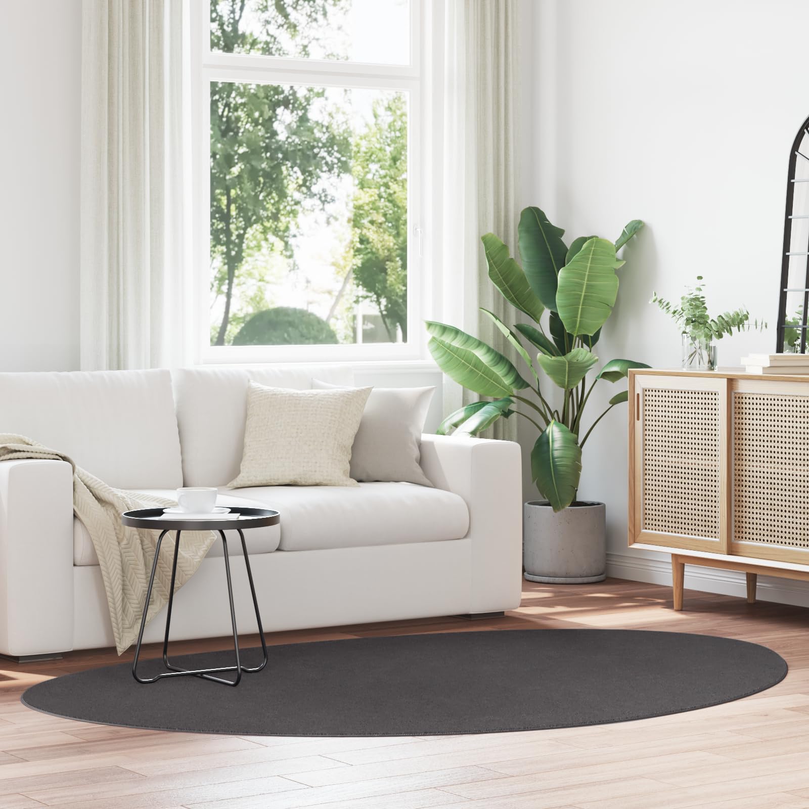 Tapis lavable HUARTE résout le problème d'entretien du salon anthracite