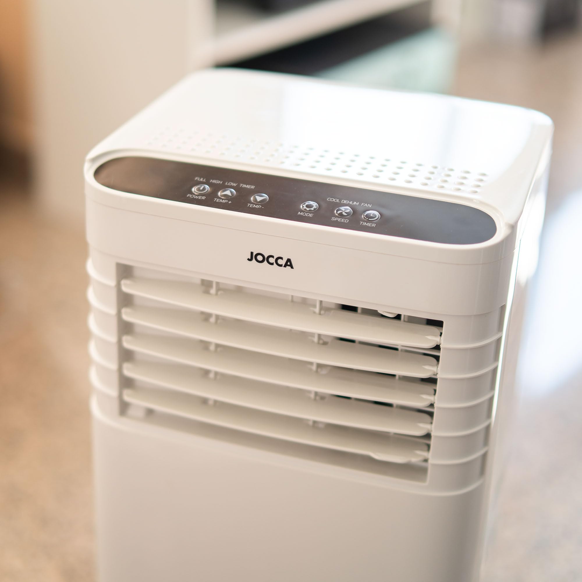 JOCCA - Aire Acondicionado Portátil 7000 BTU con Control Remoto/Temporizador 24 Horas/Potencia 785W / Ruido <65 DB/Volumen de Aire 320 M3 por H/Con Ruedas para fácil Transporte (7000 BTU)