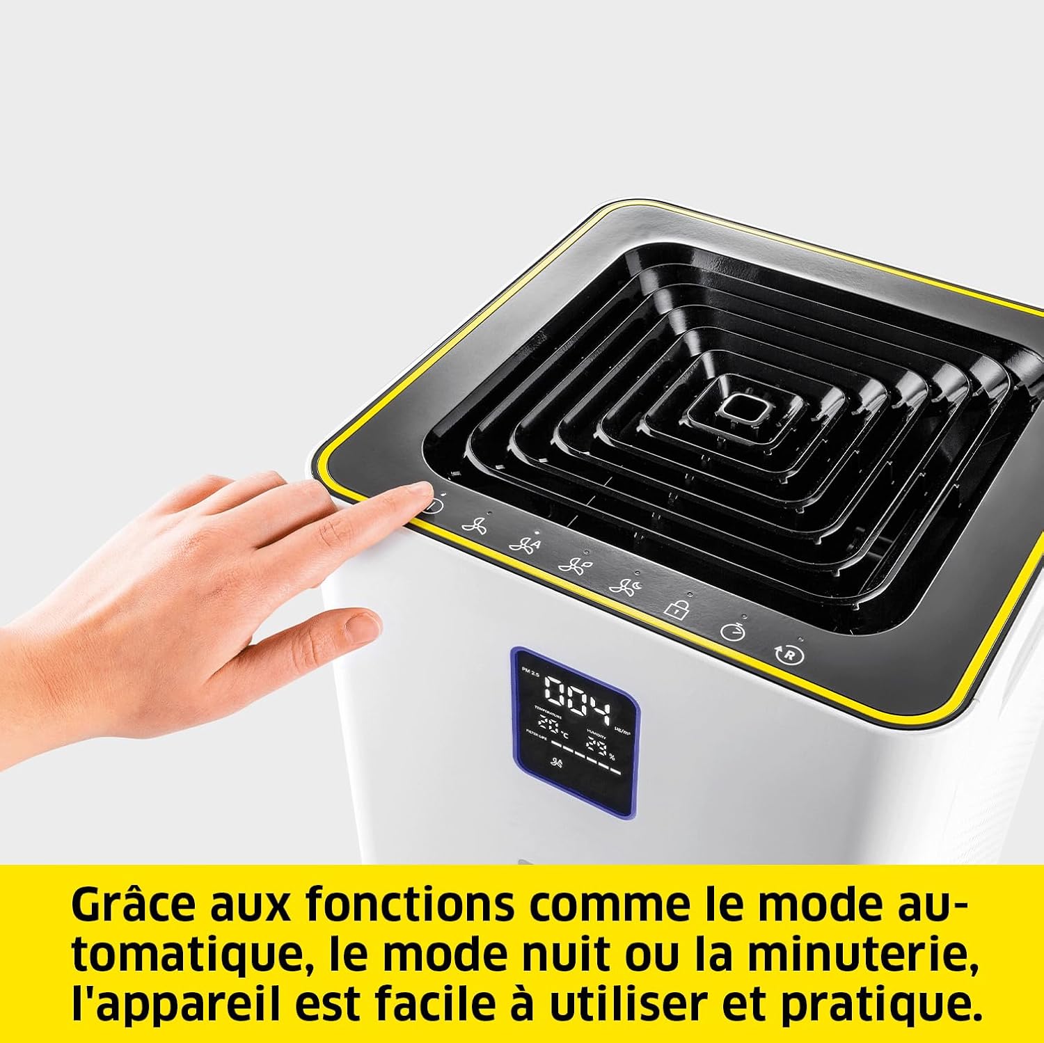 Hand interacting with the control panel of the Kärcher AF 50 Air Purifier