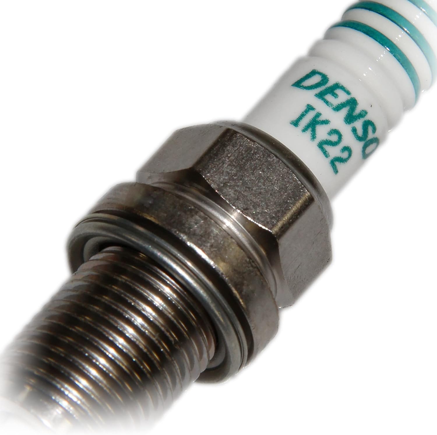 Close-up of Denso IK22 spark plug threads and ground electrode